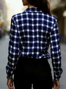 Detailed view of the retro blue and white plaid lapel long-sleeve shirt worn by a model.