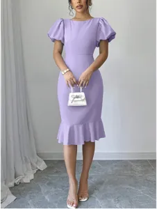 Elegant purple bodycon midi dress featuring puff sleeves and a chic ruffled mermaid hem.