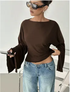 Detail view of a stylish brown long-sleeve top with dramatic flare sleeves and chic boat neckline.