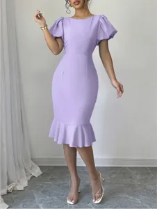 Elegant lavender midi dress featuring puff sleeves and a flattering mermaid hemline detail.