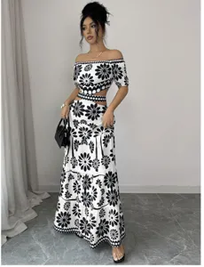 Black and white floral off-shoulder crop top and high waist maxi skirt two piece set.