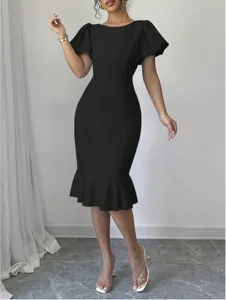 Close-up view of the elegant black midi dress featuring puff sleeves and fishtail hem design.
