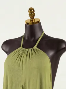 Close-up detail shot of the olive green halter neck ruched sleeveless top and soft fabric.