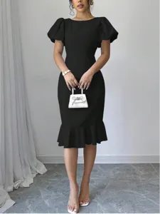 Elegant black slim mermaid midi dress with puff sleeves, perfect for chic commuter office style.