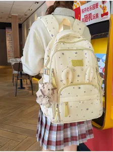 Zaino carino con motivo a stelle, orecchie di coniglio e ciondolo peluche per scuola.