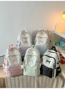 Zaino estetico a pois con fiocco, grande capacità borsa scolastica casual per ragazze.