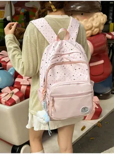 Japanese sweet pink star backpack for girls, cute casual school bag with front pockets.