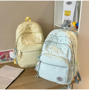 Sweet Japanese style student backpack with cute star patterns, lightweight and spacious.