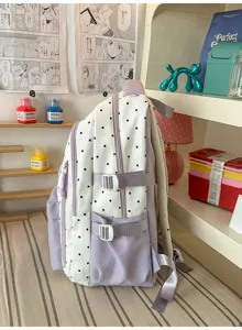 Zaino scolastico a pois carino stile Ins per donne, borsa casual leggera di grande capacità.