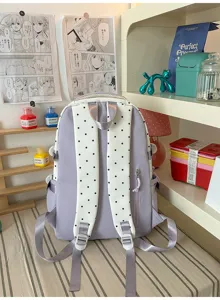 Zaino casual carino per donne, zainetto scuola viola chiaro con pois bianchi per uso quotidiano.
