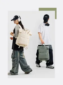 Roll-top canvas casual backpack for men and women, large capacity commuter travel laptop school bag.