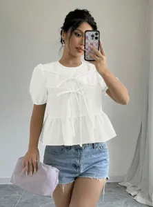 White short sleeve top featuring cute front tie ribbon details and casual summer style.