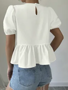 White short sleeve peplum blouse with keyhole back detail worn with casual denim shorts.