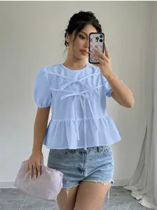 Light blue short sleeve blouse with front ribbon ties and peplum hem for women casual wear