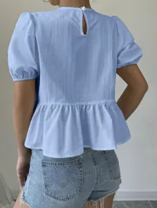 Back detail view of light blue puff sleeve blouse featuring cute back pearl button and ruffles.