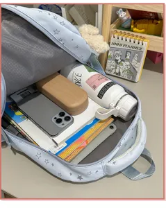 Zaino scolastico di grande capacità con motivo a stelle, zaino resistente per uso quotidiano.