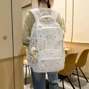 Zaino scolastico carino con stampa a stelle per ragazze con orecchie di coniglio e peluche.