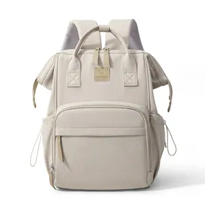 Stylish large capacity waterproof diaper backpack for moms, beige multi-function baby bag.