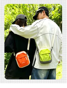 Lightweight color block crossbody bag for men and women outdoor travel casual phone bag.