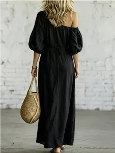 Black off-shoulder puff sleeve maxi dress with tie waist detail, elegant vacation style.