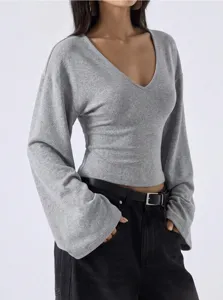 Casual grey V-neck long bell sleeve top detail view, stylish solid color slim knit apparel.