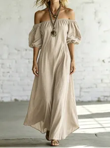 Off-shoulder puff sleeve maxi dress detail, elegant draped A-line resort wear style.