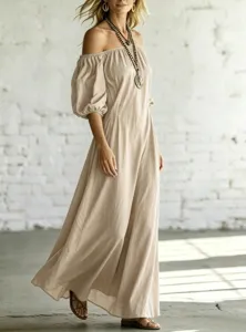 Detail shot of the elegant beige off-the-shoulder puff sleeve maxi resort dress, draped A-line.