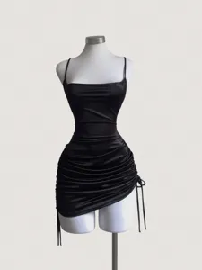 Black satin camisole mini dress featuring square neck, adjustable drawstring, and ruched bodycon design.