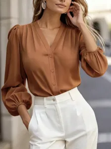 Chic V-neck office blouse with 3/4 lantern sleeves and solid color design for women detail.