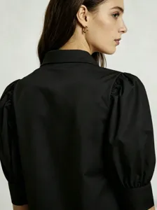 Black French puff sleeve casual shirt detail back view, solid lapel office commuting top.