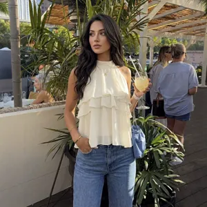 Detailed view of the layered chiffon halter top, showcasing delicate ruffles for summer fashion.