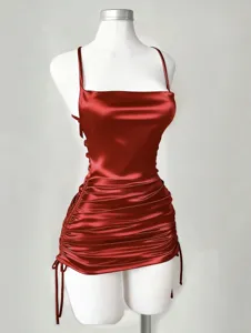 Red satin ruched camisole detail, square neckline and adjustable drawstring bodycon mini dress shape.