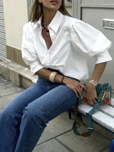 Detail shot of a French style puff sleeve casual shirt with lapel collar for daily commute.