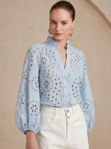 Light blue eyelet embroidered V-neck lantern sleeve blouse with ruffled stand collar.