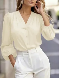 Elegant French V-neck lantern sleeve blouse detail shot, chic office lady solid color shirt.