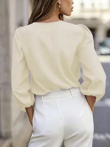 Back detail of the elegant French V-neck puff sleeve solid color blouse, chic office top.