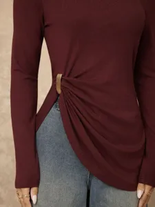 Burgundy long sleeve slim fit top with stylish side metal buckle detail and chic casual style.
