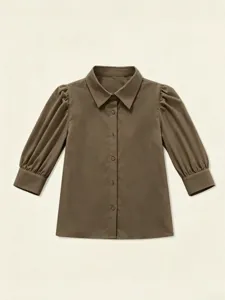 Brown puff sleeve detail of the casual French style shirt, featuring a classic lapel.