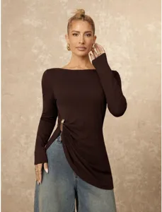 Detailed view of women's stylish solid brown long sleeve top with side ring gather feature.