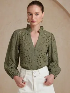 Details of the olive green V-neck eyelet embroidered ruffle collar lantern sleeve blouse.