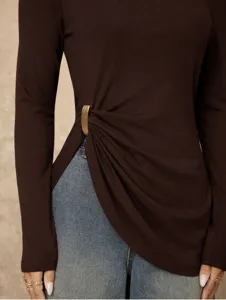 Brown long sleeve top detail featuring side gold ring slit design and slim fit fashion style.
