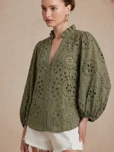 Stylish V-neck long sleeve blouse featuring delicate floral eyelet embroidery and chic ruffles.