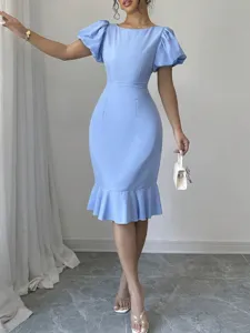 Detail view of a light blue puff sleeve midi dress, fitted fishtail silhouette, elegant.