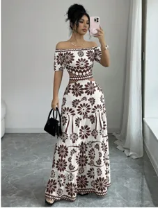 Detailed view of the stylish off-shoulder floral crop top and high waist maxi dress set.
