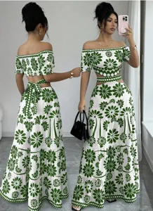 Close up detail of floral print off shoulder short top and high waist cutout maxi skirt