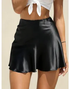 Detail view of a sleek black satin mini skirt featuring high waist and smooth fabric texture.