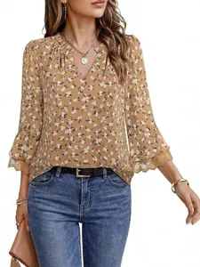 Casual floral long sleeve blouse for women with elegant lace trim and V-neck design.