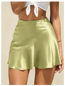 Satin mini skirt detail showing smooth glossy fabric, high waist design, and elegant flare.