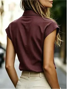 Detail view of this elegant striped short sleeve shirt featuring a classic lapel collar style.
