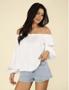 Elegant off-the-shoulder long sleeve blouse paired with chic denim shorts for women.
